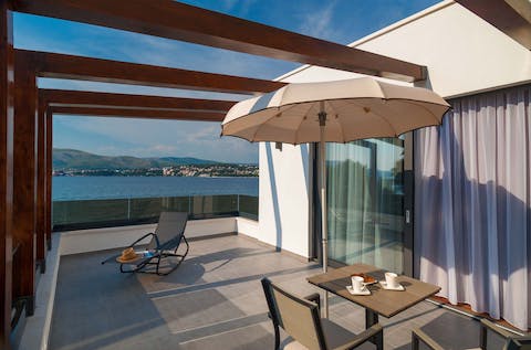 Enjoy breakfast on the terrace as you admire the view over the sea