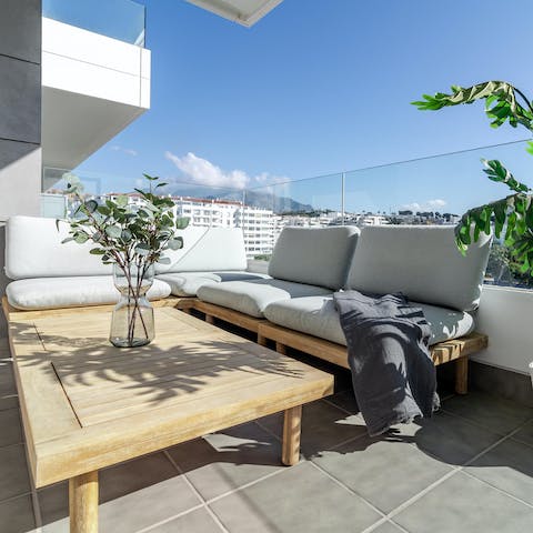Spend afternoons relaxing around your plush outdoor sofa, sipping on wine and chatting away