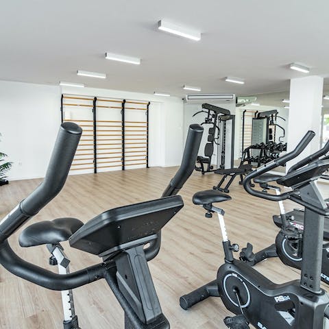 Start your day right with a morning sweat session in your building's well-equipped gym