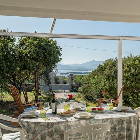 Enjoy alfresco meals while feasting on glorious sea views from the patio