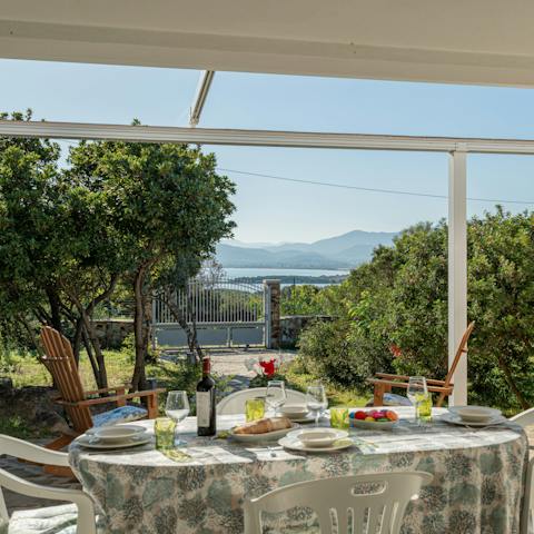 Enjoy alfresco meals while feasting on glorious sea views from the patio
