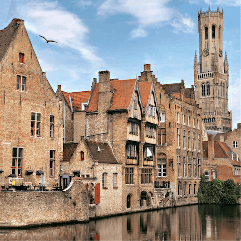Take a day trip to beautiful Bruges – you can be there in thirty minutes
