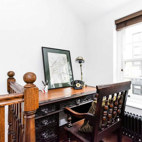 Catch up on work at the antique desk upstairs