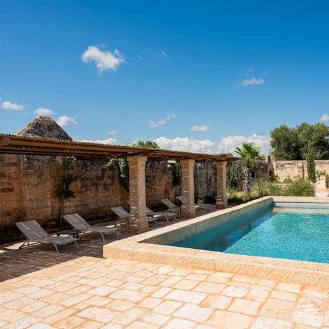 Soak up the Puglian sun from in or beside the private pool