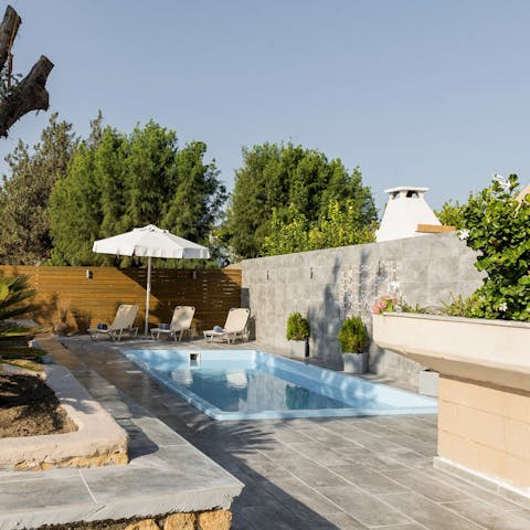 Enjoy refreshing dips in the private swimming pool