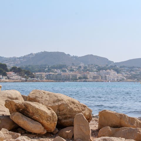 Take the short drive to one of the nearby sand and rock beaches of Moraira