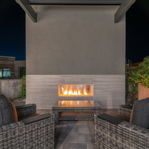 Warm your cockles by the outdoor fireplace under the stars