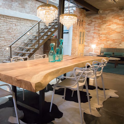 Dine in amid the industrial loft-style decor of this home