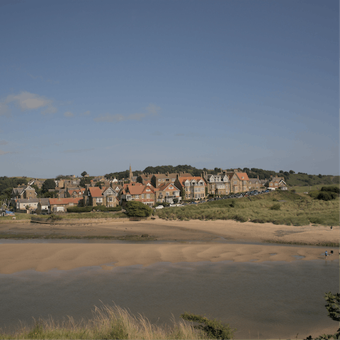 Take a seven-minute coastal drive to Alnmouth for a day on the beach