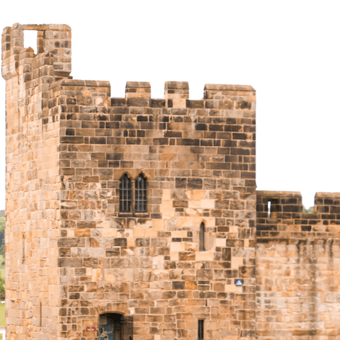 Immerse yourself in history at Alnwick Castle, fifteen minutes away by car