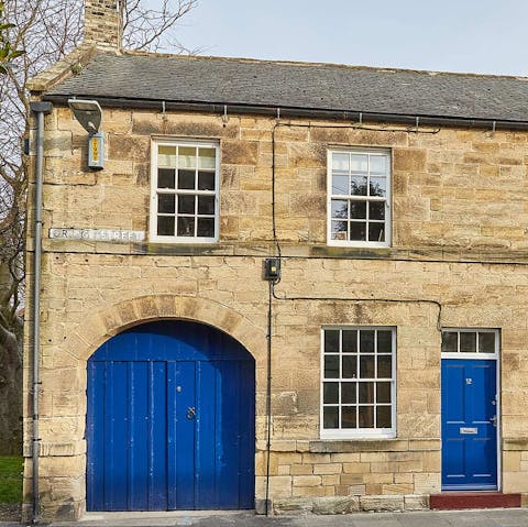 Admire the original exterior and doors of this former blacksmiths' building