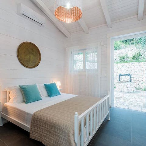 Sleep soundly in your romantic, beach hut style bedroom