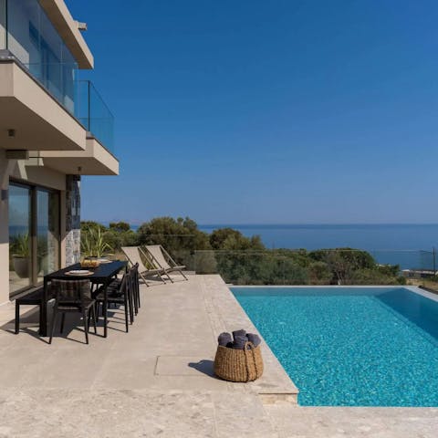 Soak up the Cretan sunshine with your family on the elevated pool terrace