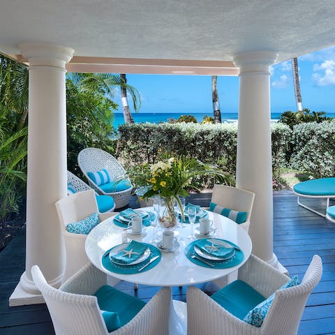 Listen to the sounds of the waves as you take your meals on the quaint deck