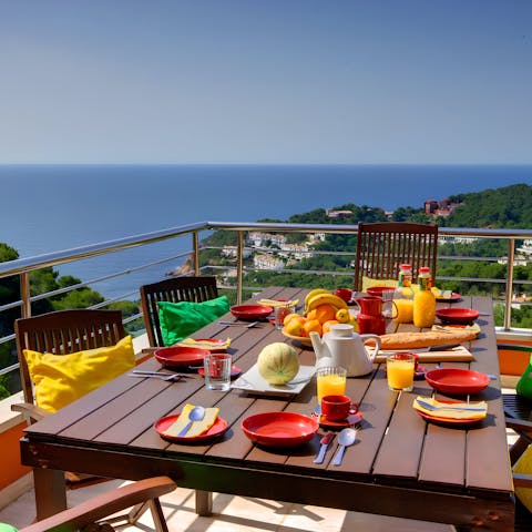 Enjoy an alfresco feast overlooking the Mediterranean