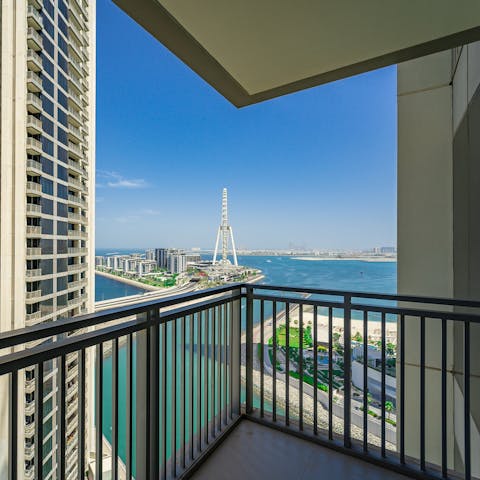 Admire the amazing view of Dubai's beating heart from the balcony