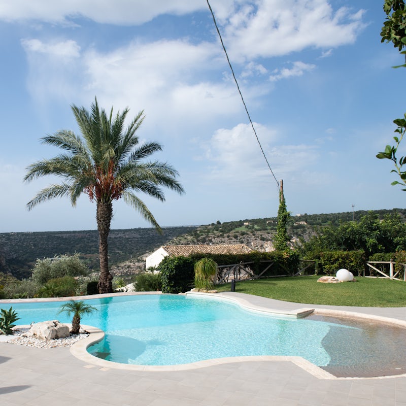 Go for a dip in your own private pool, surrounded by stunning natural views of Sicily