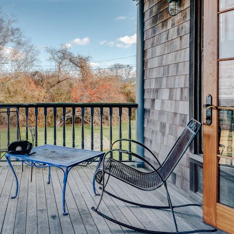 Relax in the rocking chair on the peaceful veranda