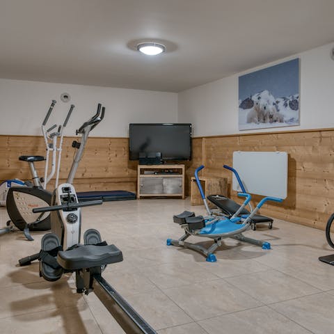 Keep up your fitness routine with a sweaty session in the home's gym