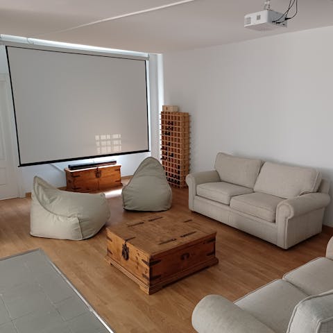 Grab some popcorn and have a family movie night in the home cinema room
