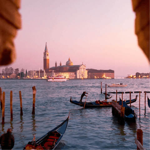 Take a magical gondola ride over to St. Mark's Square
