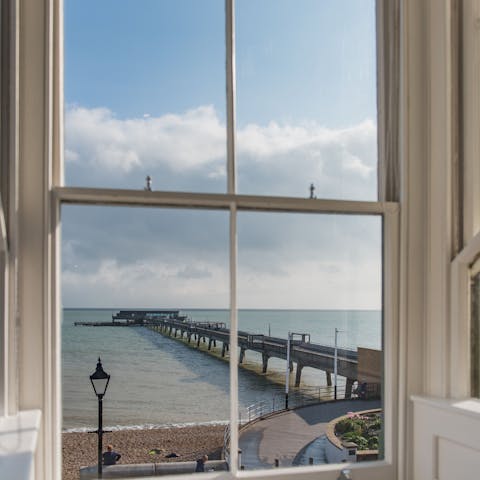 Admire the coastal views from the living room with a hot cup of coffee