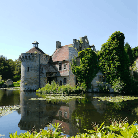 Drive thirteen minutes to the National Trust property of Scotney Castle 