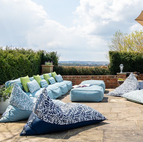 Relax with a drink on the terrace and take in the view of the Kent countryside 