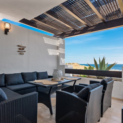 Soak up the sea views while playing cards your private terrace