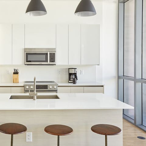 Gather around the kitchen island for a group cooking session 