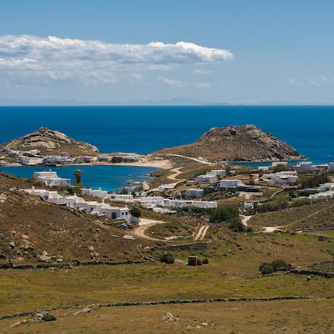 Drive down to the Mykonos coastline in five minutes and swim in the Aegean Sea