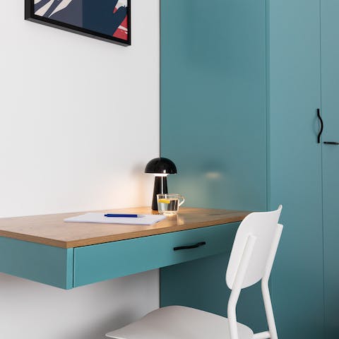 Catch up on emails or spend some time journaling at your sleek desk space