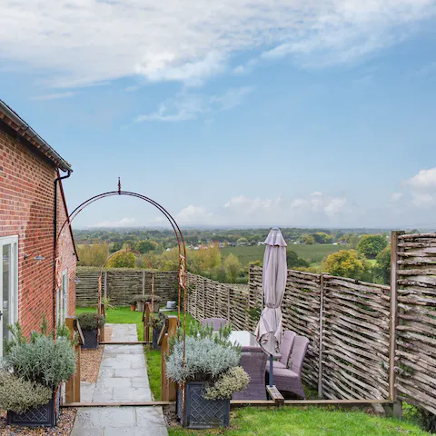 Host a barbecue in the garden overlooking the countryside