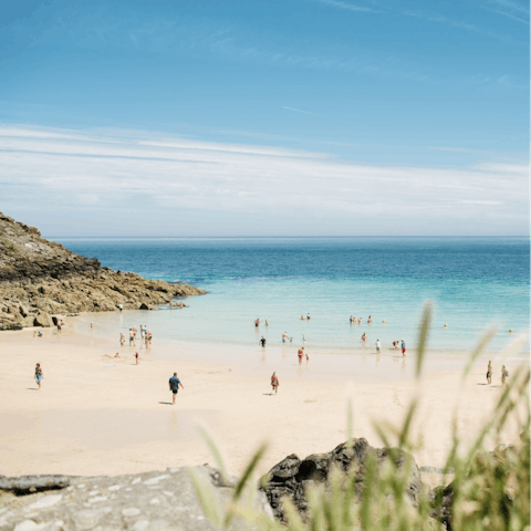 Spend sunny afternoons relaxing on Porthminster Beach, a five-minute walk away