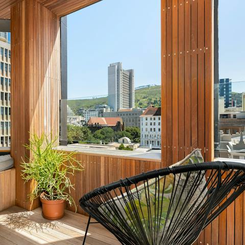 Curl up on the balcony with a glass of South African wine