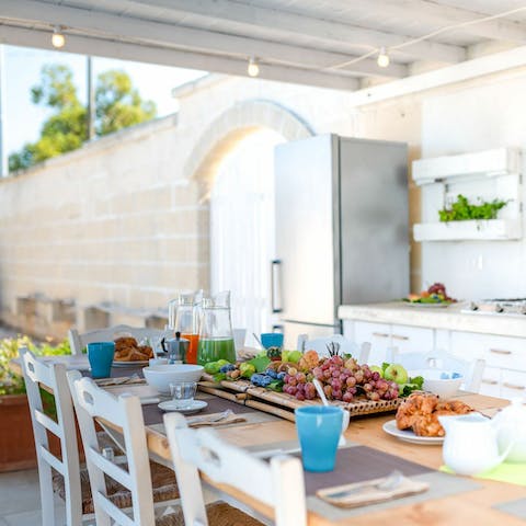 Rustle up a feast in the outdoor kitchen and dine alfresco on the veranda