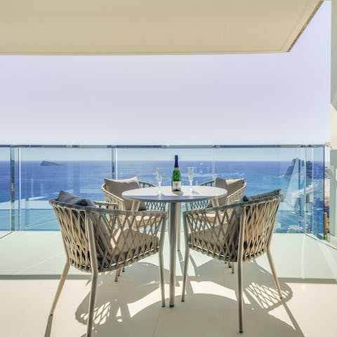 Pour a glass of wine and admire the views from the balcony