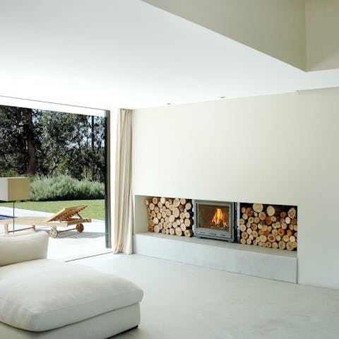 Warm up by the contemporary fireplace on cooler evenings