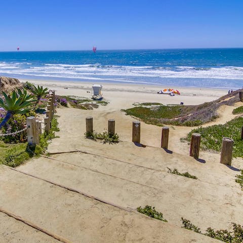 Enjoy direct access to the beach from this ocean-view home