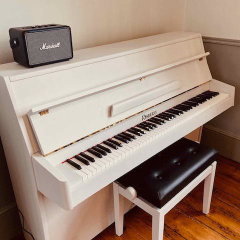 Play a tune on the elegant piano