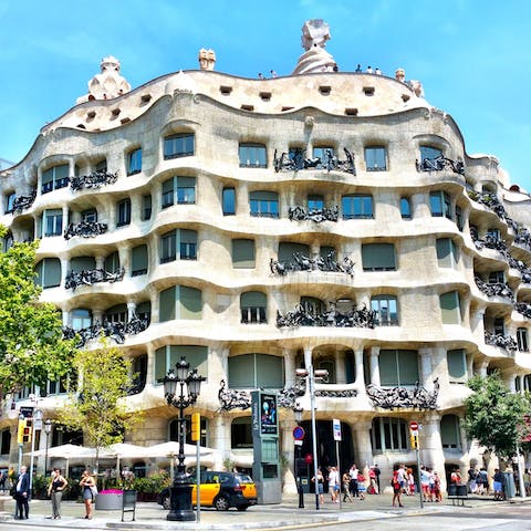 Take the fifteen minute walk to Casa Milà on the famous Passeig de Gràcia