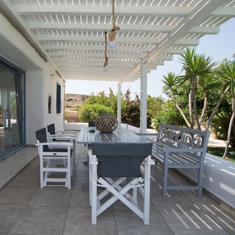 Wake up with a traditional Greek breakfast on the covered terrace
