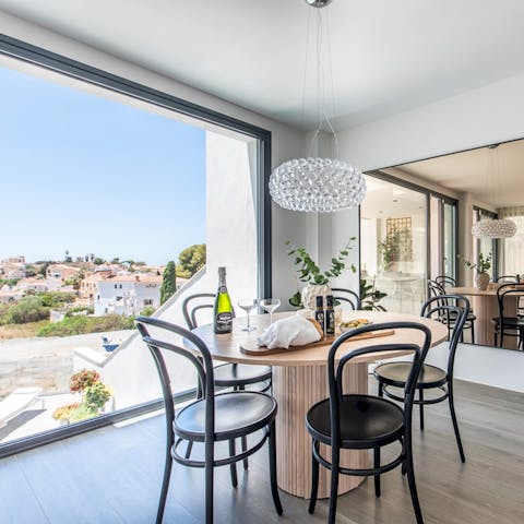 Discuss your itinerary over a Spanish breakfast by the giant windows