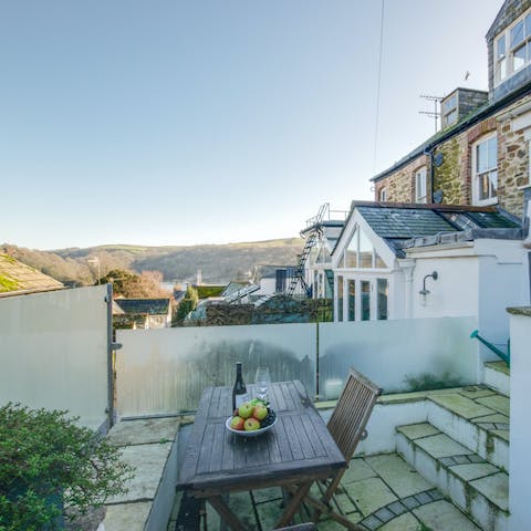 Sip a glass of wine on your terrace as the sun sets over the estuary