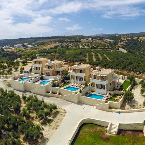 Gather the whole group together in four identical villas