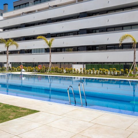 Dive into the communal pool for a refreshing dip