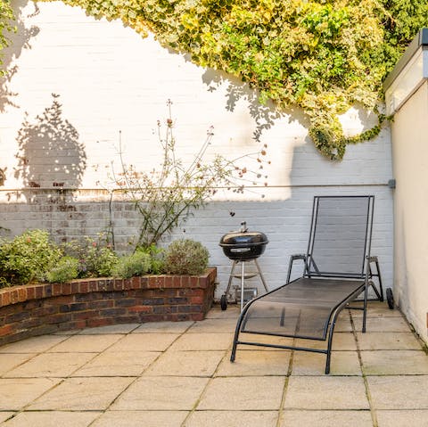 Fire up the barbecue for an alfresco meal in the sunny courtyard