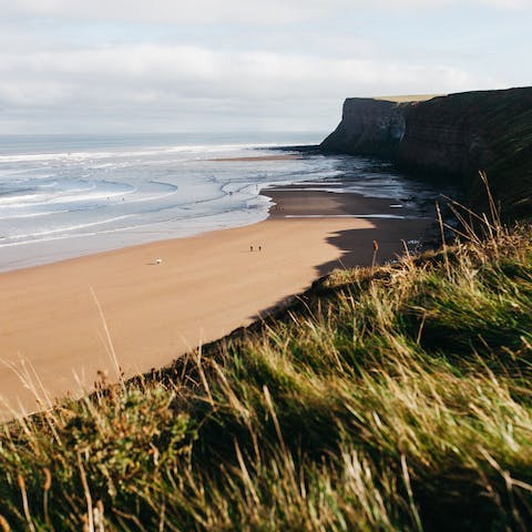 Venture out to Kettleness beach, only a fifteen-minute drive away