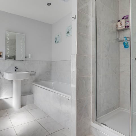 Treat yourself to an uninterrupted soak in the sleek bathtub