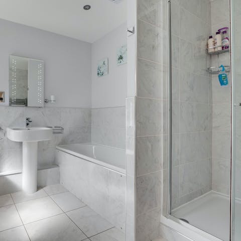 Treat yourself to an uninterrupted soak in the sleek bathtub